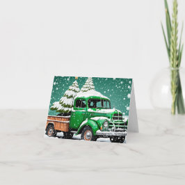 Oude groene vrachtwagen met kerstboom achterin. notitiekaartje