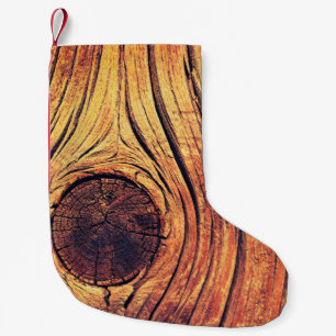 Oude houten textuur als achtergrond.  kleur kleine kerstsok