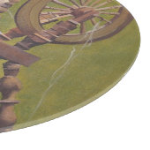 Oude Ierse vrouw die in een draaiend wiel zit Snijplank (Hoek)