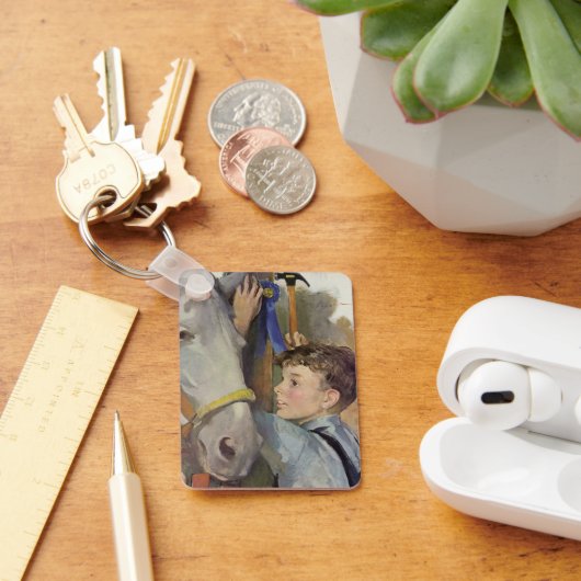 Oude jongen met zijn blauwe lint winnende paard sleutelhanger (Bureau)