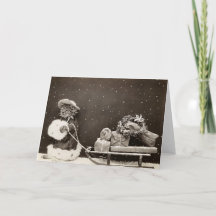 Oude kerstkat trekt cadeauslee foto