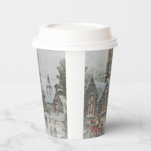 Oude kerstman met kinderen voor een kerk papieren bekers (Links)