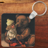 Oude kerstspullen, pop en teddybeer sleutelhanger (Achterkant)