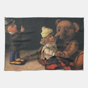 Oude kerstspullen, pop en teddybeer theedoek