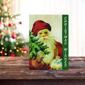 oude klassieke kerstman met kerstboom feestdagen kaart