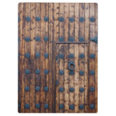 Oude kleine deur binnen grote versterkte houten de klembord (Achterkant)