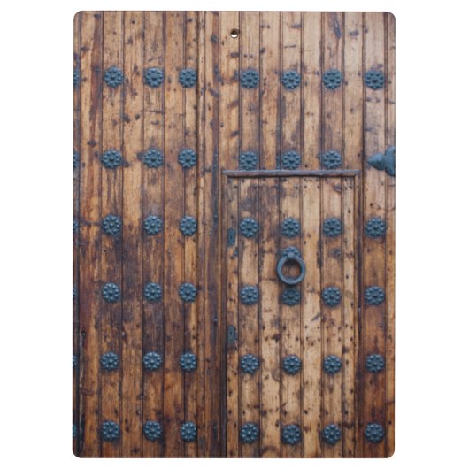 Oude kleine deur binnen grote versterkte houten de klembord (Achterkant)