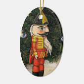 Oude notenkraker onder kerstboom keramisch ornament (Links)