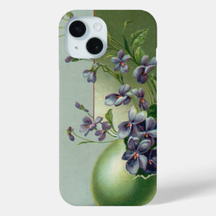 Oude paarse bloemen bloeiend in een paasei iPhone 15 case
