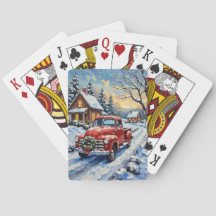 Oude rode kersttruck op besneeuwde landweg pokerkaarten