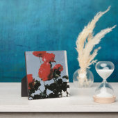 Oude rode rozen tegen een blauwe lucht fotoplaat (Insitu)