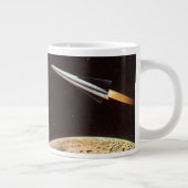 Oude sciencefiction, raket over de maan grote koffiekop (Rechts)
