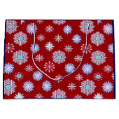 Oude sneeuwvlokken op rood groot cadeauzakje (Voorkant)