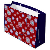 Oude sneeuwvlokken op rood groot cadeauzakje (Achterkant Gekanteld)