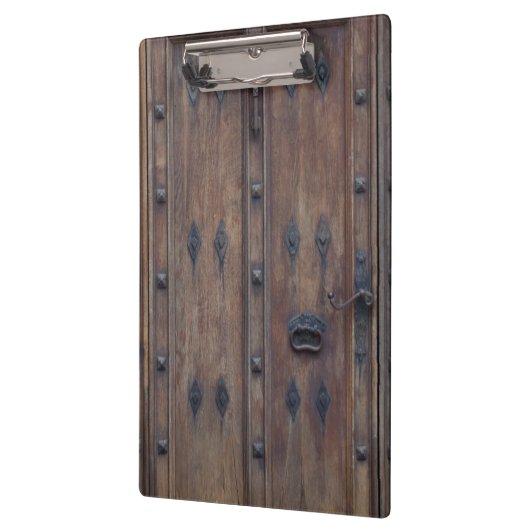 Oude Spaanse houten deur met bouten Klembord (Links)