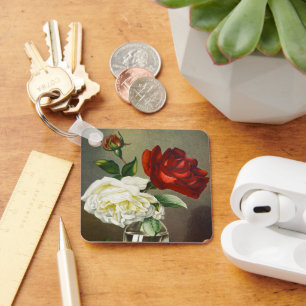 Oude tuinrozen in een glazen vaas sleutelhanger