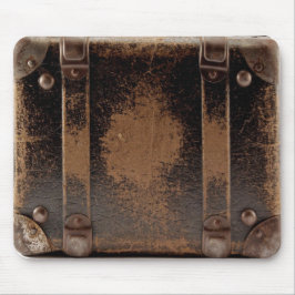 Oude, versleten lederbagage muismat