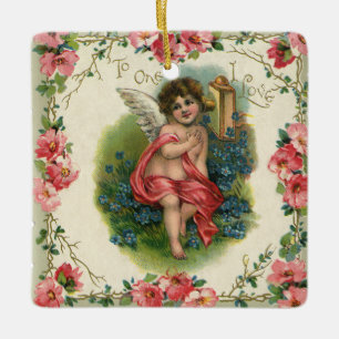 Oude victoriaanse valentijnsdag cherub op de telef keramisch ornament