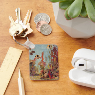 Oude vis in oceaan, tropische koraal engelvis sleutelhanger