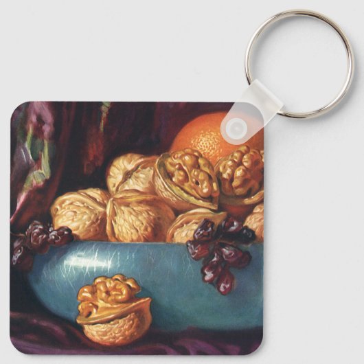 Oude voeding, walnoten en fruit in een blauwe kom sleutelhanger (Achterkant)