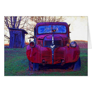 Oude vrachtwagen en outhouse