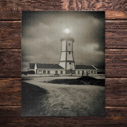 Oude vuurtoren op een storm nacht legpuzzel