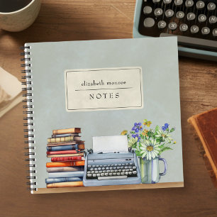 Oude waterverfboeken en typemachine notitieboek