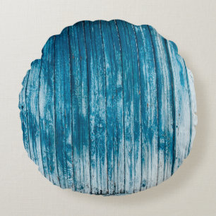 Oude wethermde schil, van hout, met bleek blauw rond kussen