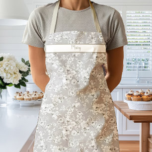 Oude witte rozen op taupe schort