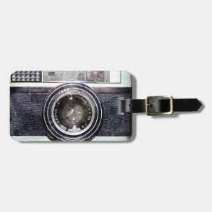 Oude zwarte camera bagagelabel