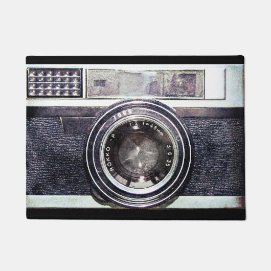 Oude zwarte camera deurmat (Voorkant)