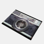 Oude zwarte camera deurmat (Schuin)