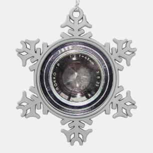 Oude zwarte camera tin sneeuwvlok ornament