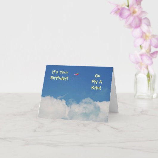 "OUDERE HUMOR, VLIEG EEN KITE" KAART (Orchidee)