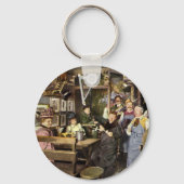 Ouderwetse bar met mensen vieren, een feest sleutelhanger (Achterkant)