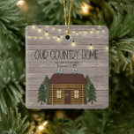 Our Country Home Log Cabin Your Address Christmas Keramisch Ornament<br><div class="desc">This adorably country Christmas Ornament features a primitive rustic log cabin with stone chimneys and tall pine trees. A foliday werath hangs on the door and a string of vintage string lights hang overhead. OUR COUNTRY HOME in cute, country text and the address of your country home. You can easily...</div>