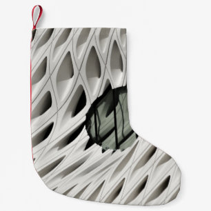 Ovaal zwart glas op wit oppervlak kleine kerstsok