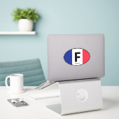 Oval Franse vlag landcode vinyl auto sticker (Laptop op bureau)