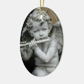Oval Ornament Cherub die zijn flute speelt (Links)
