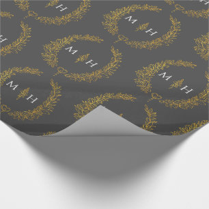 Ovale bladmonogram tekening goud op donkergrijs cadeaupapier
