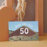 Over the Hill 50th Funny Birthday Kaart<br><div class="desc">Maak licht op iemands 50e verjaardag met dit humoristische wenskaart met het foto-afbeelding van een steile heuvel,  samen met de spreekwoordelijke 'Over the Hill'-grap.</div>