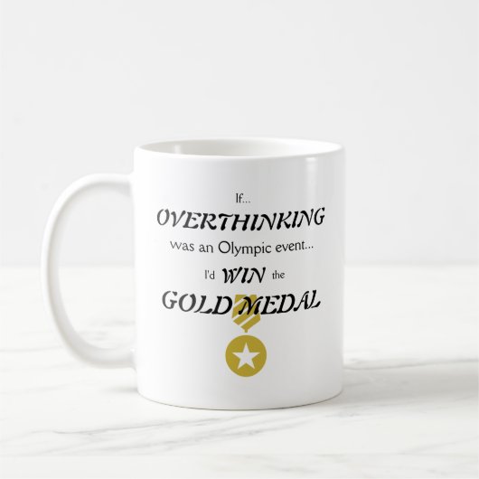 Overdenkende goudmedaille koffiemok (Links)