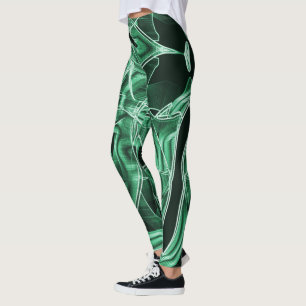 Overlappende en gekruiste groene acryluitsnijdinge leggings