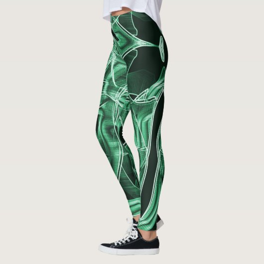 Overlappende en gekruiste groene acryluitsnijdinge leggings (Links)