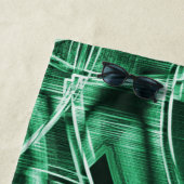 Overlappende en gekruiste groene acryluitsnijdinge strandlaken (In situ)