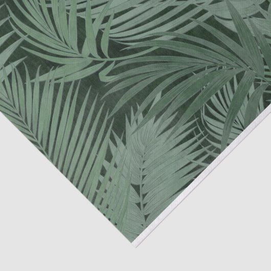 Overlappende groene varenbladeren op donkere achte tissuepapier (Detail)