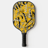Overlappende naam herhalen over geel pickleball paddle (Voorkant)