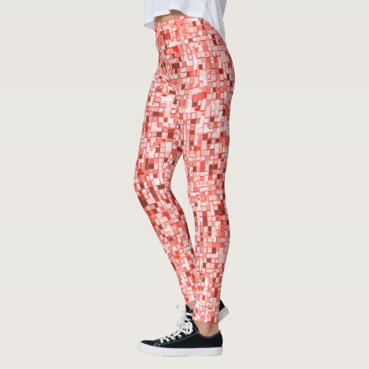 Overlappende vierkanten, tonen van rood of koraal leggings (Links)