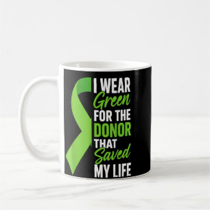 Overlevende stamceltransplantatie bedankt donor koffiemok