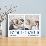 Oy to World | 2 Foto Hanukkah Feestdagenkaart<br><div class="desc">Whimsical Hanukkah-fotokaart bevat twee van uw favoriete familiefoto's in een vierkant formaat dat naast elkaar is uitgelijnd. "Oy to the World" staat onder in blauw uitsnijding. Pas met uw familienaam of namen, douanegroet, en het jaar langs de bodem aan. Een grappige en moderne Hanukkah-kaart die is ontworpen om uw feestelijke...</div>
